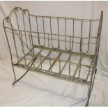 A Victorian painted metal folding child's rocking crib/cradle