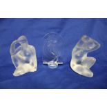 A pair of Lalique glass figures of kneeling nude females, signed "Lalique France",