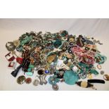 A box containing a large selection of costume jewellery