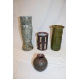 Four pieces of Studio pottery including oval pottery vase with leaf decoration etc.
