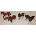 Four various Beswick china brown horses including Red Rum,