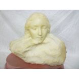 A large 19th century carved marble figure of a female head on a rocky rustic base signed "Delpeche"