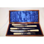 A good quality five-piece carving set by Joseph Fenton of Sheffield with game scene engraved blades