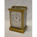 A good quality carriage clock with rectangular enamelled dial by W.