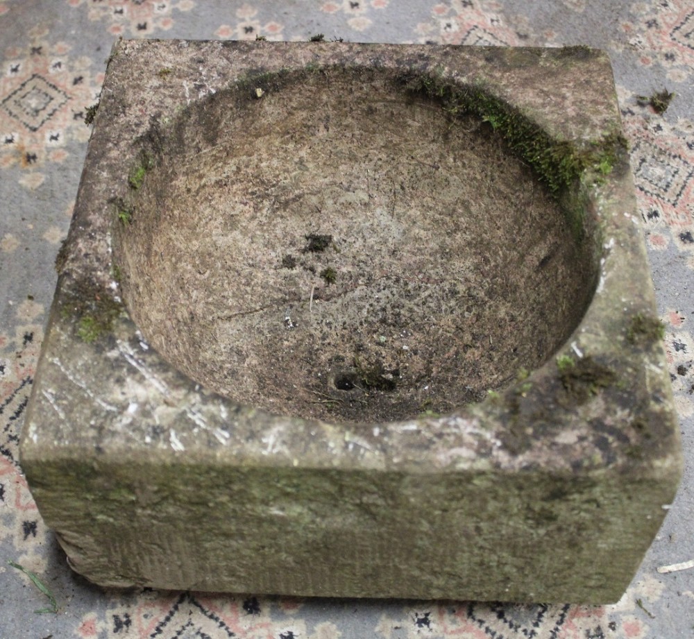 An old cut marble square top for a fountain/bird bath,