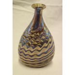 A Cornish art glass tapered spill vase by Norman Stuart Clarke with rippled decoration,