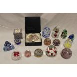 A selection of various glass paperweights including Murano, Perthshire, Caithness,