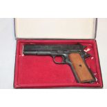 A Bruni 8mm blank firing automatic pistol,