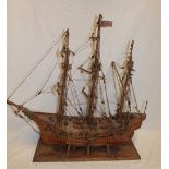 A wooden scale built model of a three-masted gun boat 26" long