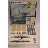 A Hornby Minic ship's Naval harbour set in original box