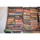 Four boxes containing a selection of small classical literature volumes etc.