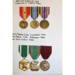 Two groups of United States medals including US Navy/Marine Corps Commendation medal,