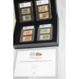 A 50th Anniversary of decimalisation gold-plated brass eight-piece miniature bank note medallion