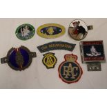 A selection of various car badges including Royal Army Ordnance Corps, 14th Light Royal Artillery,