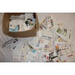 A box containing a large selection of various World first day covers and postal covers