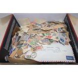 A box containing mixed World stamps