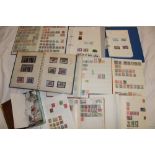 Various albums and stock books of mixed World stamps together with loose stamps,