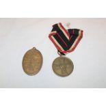 A German 1939 War Service medal and a German 1914-1918 oval War Service medal (2)