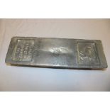 A rare Cornish mining tin ingot for the Cornish Tin Smelting Co of Redruth with lamb and flag