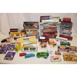 A selection of various boxed and unboxed diecast vehicles including packeted Matchbox cars,