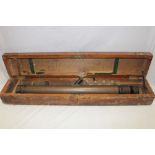 A brass and painted metal gun sighting telescope by W Ottway & Co in fitted wooden case