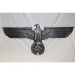 A copy German aluminium eagle and swastika plaque used for railway carriages and vehicles,