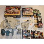 A selection of various Star Wars toys including French Star Wars Millenium Falcon vehicle in