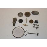 A selection of various locally found artefacts including medieval chatelaine mount, medieval buckle,
