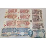 Three brown £10 notes signed Hollom/Page; two blue GB £1 notes signed Peppiatt;