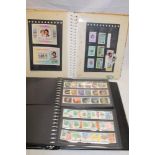 An album containing a collection of mint British Commonwealth stamps including some sets and mini