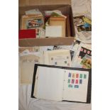 A large box containing numerous albums of World stamps, album pages of stamps, packets,