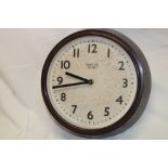 A vintage Smith's Sectric wall clock in bakelite circular case