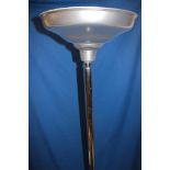An Art Deco chromium-plated up-lighting standard lamp with black acrylic base and aluminium shade,