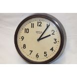 A vintage Smith's Sectric wall clock in bakelite circular case