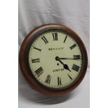 A 19th century wall clock by Maple & Co.