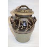 A Truro pottery two-handled tapered vase and cover with brown banded decoration 10" high
