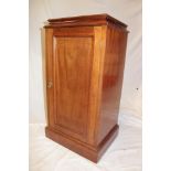 A late Victorian inlaid mahogany bedside cupboard with single panelled door