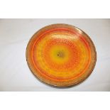 A Poole pottery "Aegean" circular shallow bowl with orange and yellow decoration 10½" diameter