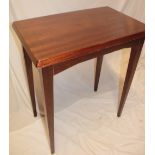 A polished mahogany rectangular occasional table by Heals of London,