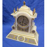 A 19th century French mantel clock with gilt decorated circular dial in polished white marble and