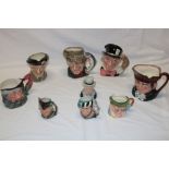 A collection of various china Toby jugs including Royal Doulton "Poacher",