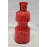 A Czechoslovakian 1970's Prachen Art Glass tapered vase with red mottled decoration,