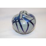 A Cornish art glass tapered vase by Norman Stuart Clarke with lustre web decoration,