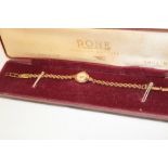A ladies 9ct gold wristwatch by Rone with 9ct gold strap in maker's case