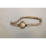 A ladies 9ct gold wristwatch by Omega with circular link bracelet and rolled gold clasp