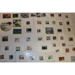 A selection of over 70 unframed small coloured etchings by Ian Laurie - mainly Cornish scenes,