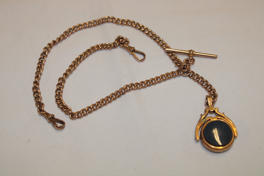 A 9ct gold pocket watch chain Albert supporting a swivel fob seal (34g gross)