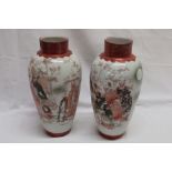 A pair of Japanese Kutani china tapered vases with painted figure decoration,