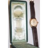 A gentleman's vintage 14ct gold wristwatch by Rolex "Rolex Oyster Perpetual Officially Certified