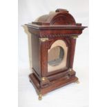 A good quality oak bracket clock case with fluted columns and brass mounts 19" high